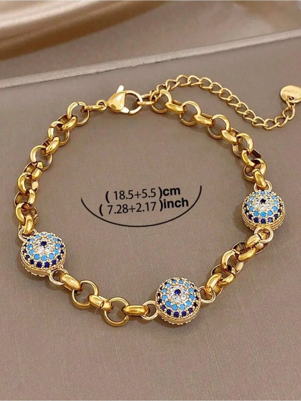 Gold-Tone Bracelet with Blue and White Crystal Discs